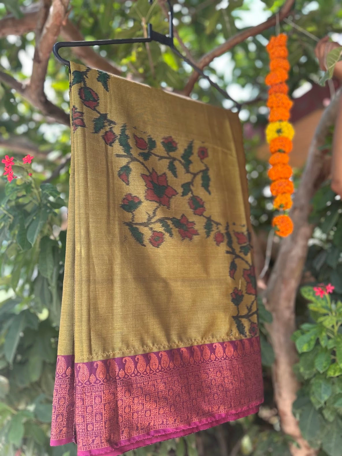 Green and Orange Saree with Copper Zari Accents