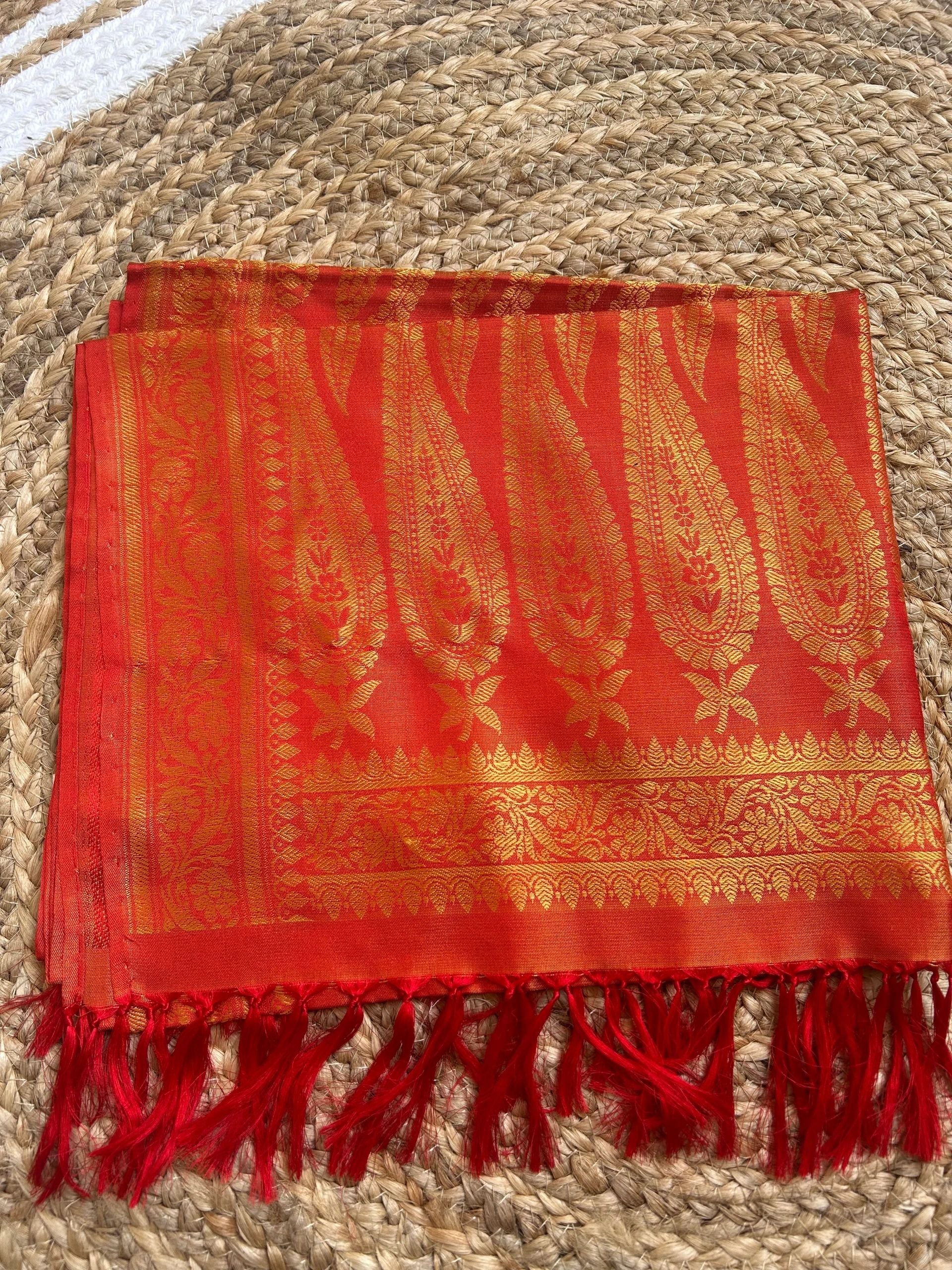 Orange with gold motifs stole