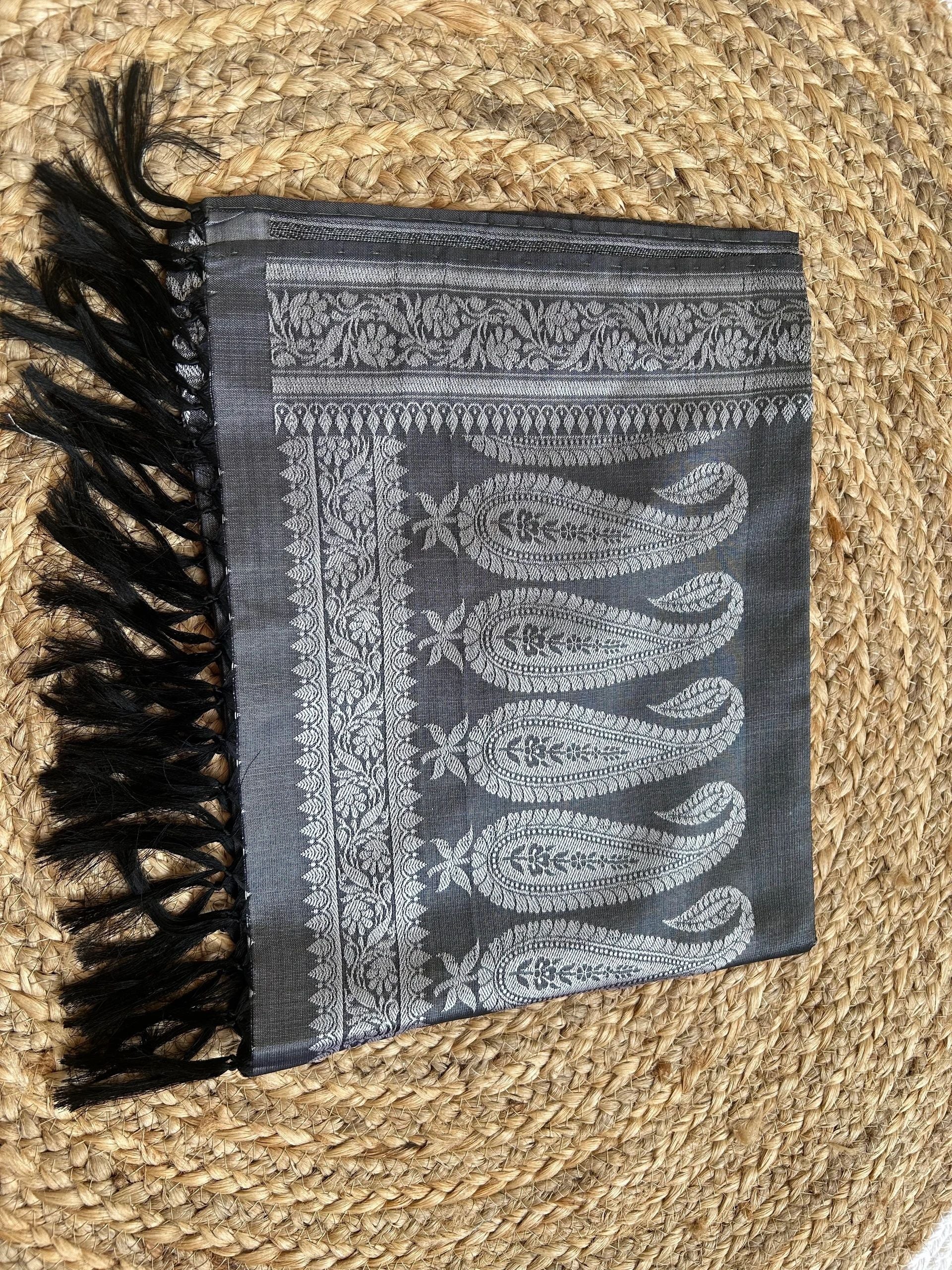 Grey with silver motifs and black tassels stole