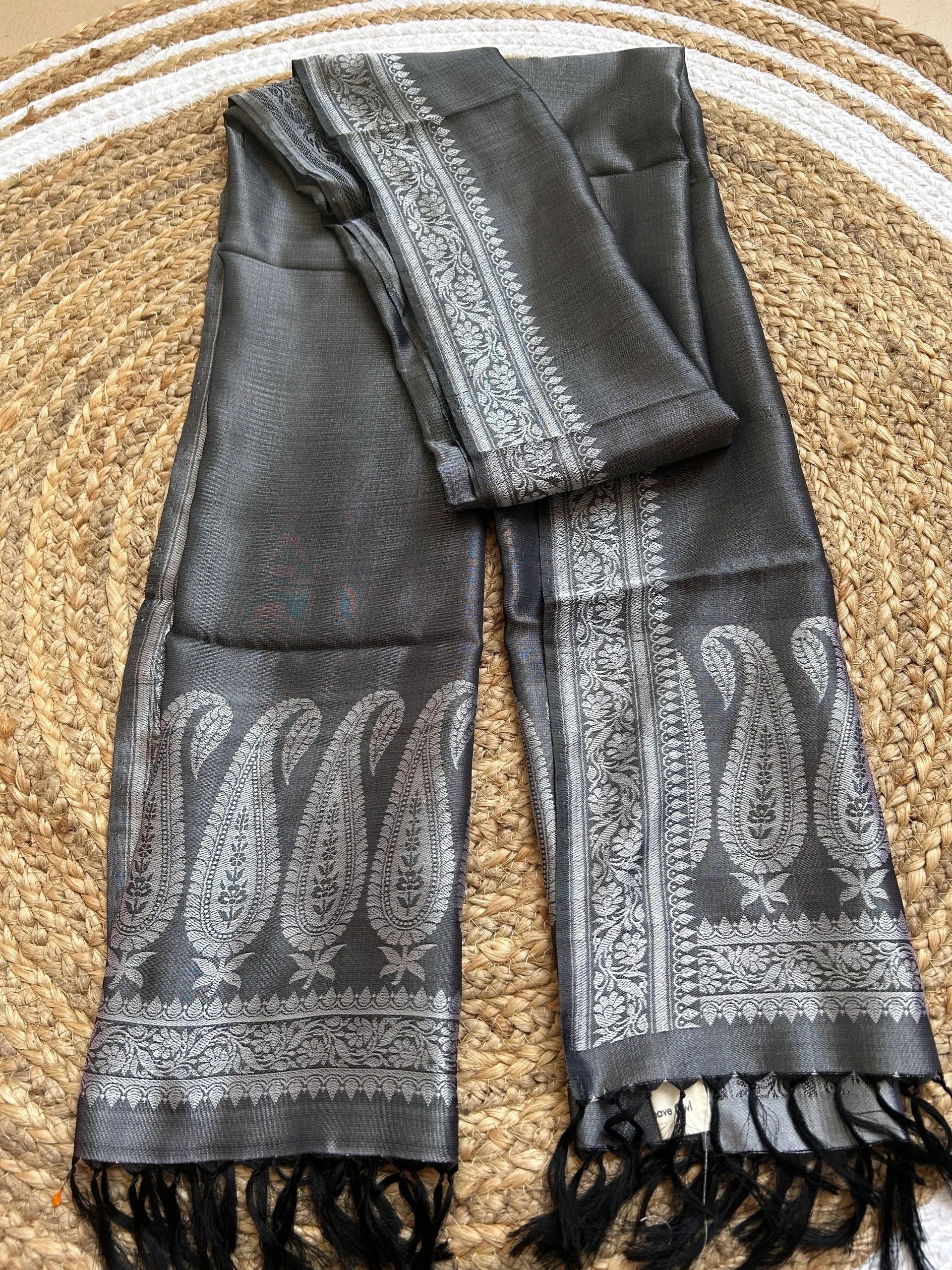 Grey with silver motifs and black tassels stole
