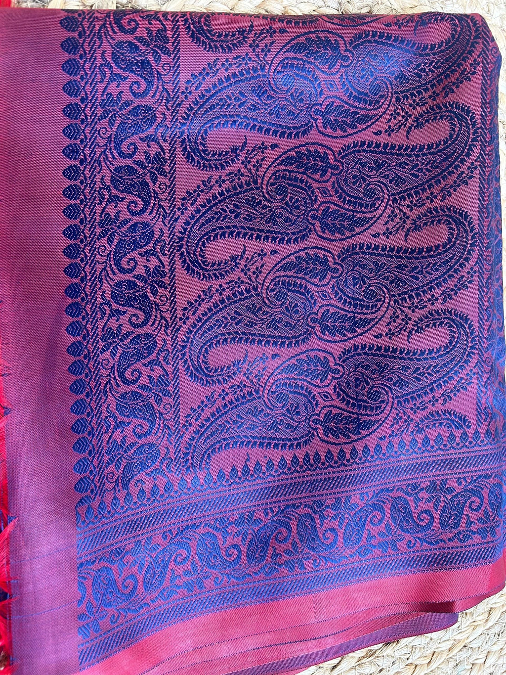 Red body with blue motifs stole