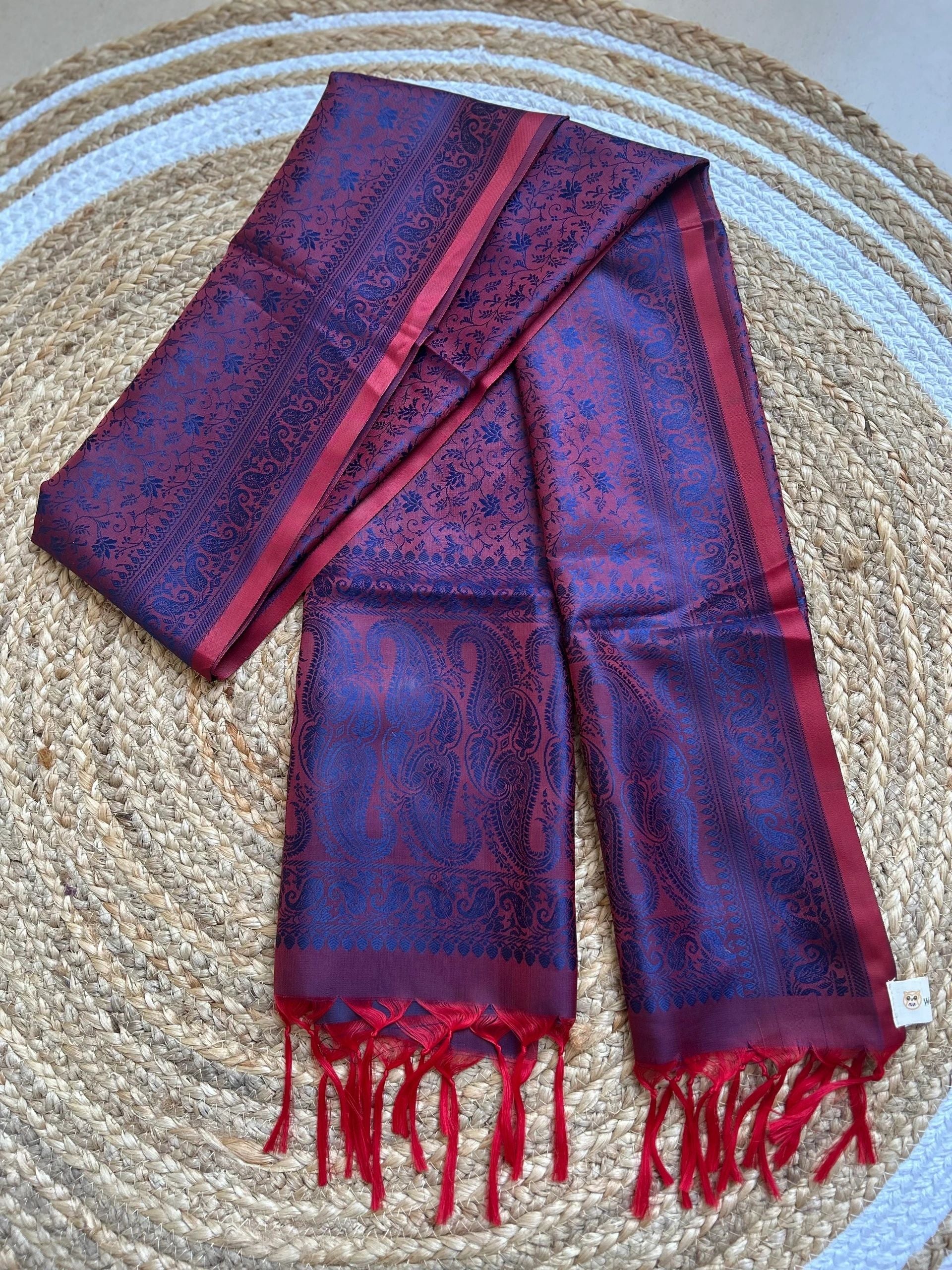 Red body with blue motifs stole